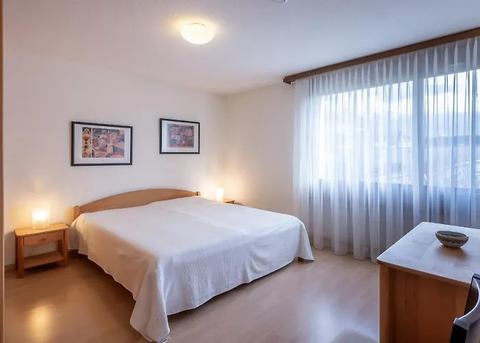 Apartment Putzprinz Gujan Ferienwohnung, Haus Surmir B / 16 Flims
